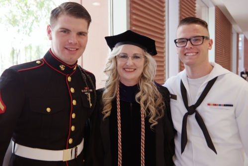 Debra on Graduation Day, with her God son, Mike Jones (left), and son Michael.